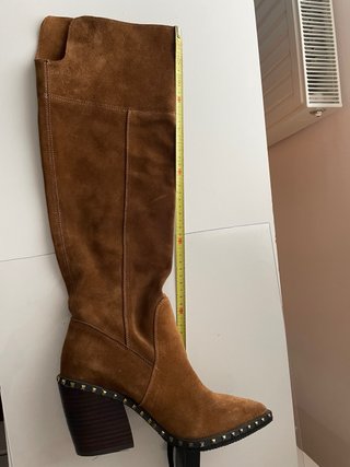 Botas altas ante marrón tachuelas