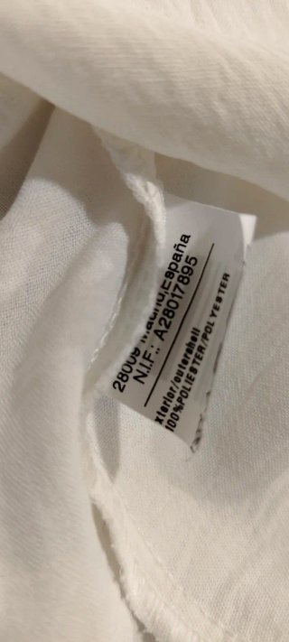 Blusa blanca con volante mangas