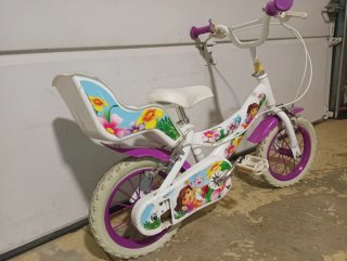 Bicicleta niña de 12", con ruedines de apoyo. Dora