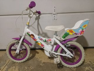 Bicicleta niña de 12", con ruedines de apoyo. Dora