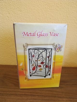 Jarrón de cristal con metal decorado