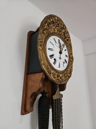 Reloj de péndulo antiguo dorado