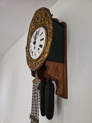 Reloj de péndulo antiguo dorado