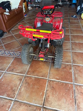 Quad eléctrico infantil rojo