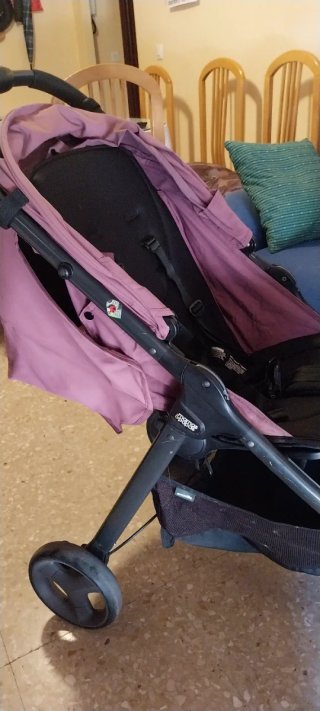 Carrito de bebé rosa y negro