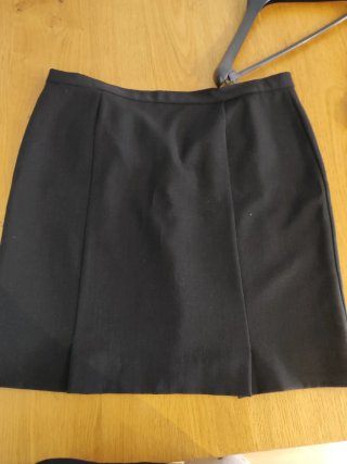 Traje de chaqueta y falda negro mujer