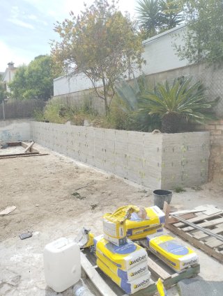 Colocación de azulejos rebosar una pared y reparac