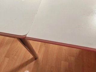 Mesa extensible de cocina con cajón.