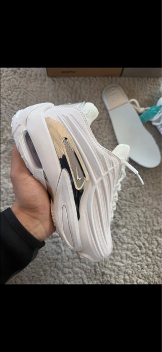 Nike NOCTA Blanco y Plateado
