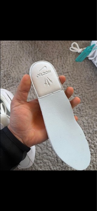 Nike NOCTA Blanco y Plateado