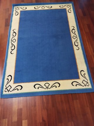 Elegante Alfombra Decorativa Azul y Crema