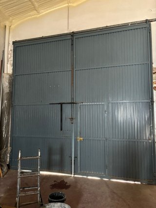 Puerta de cochera hierro abatible