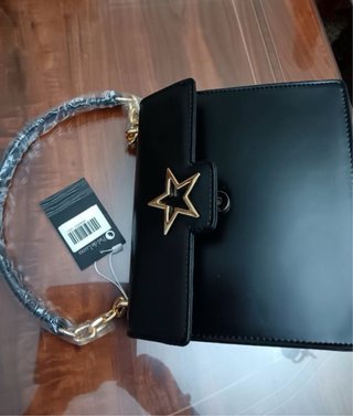 Bolso Negro Cristian Lay Estrella Dorada