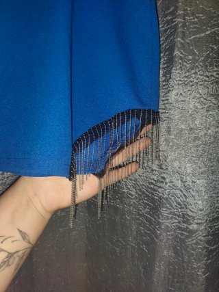Faldas negras y azules con flecos