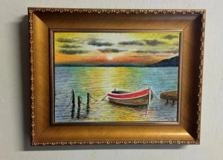 Quadro tramonto sul mare con cornice dorata
