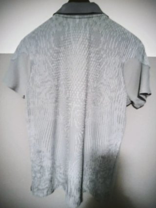 Polo deportivo Nike gris