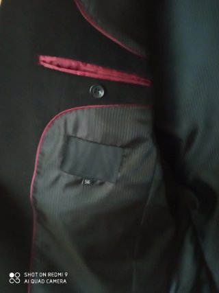 Chaqueta elegante , paño negra completamente nueva
