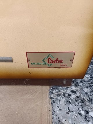 ESTUFA DE LEÑA O CARBÓN DE HIERRO Y METAL.