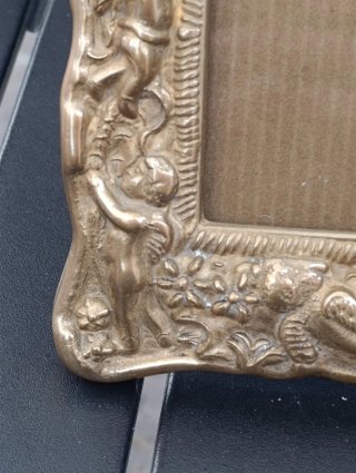 Cornice antica in ottone dorato