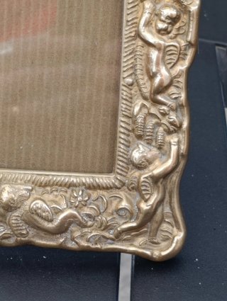 Cornice antica in ottone dorato