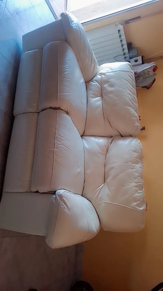 Sofá eléctrico de piel blanco
