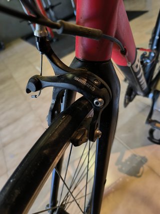 Bicicleta carretera + rodillo entrenamiento