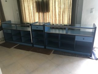 Módulo central mostrador  azul con un cajón