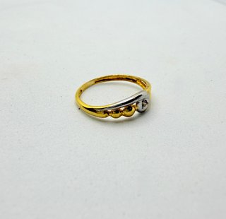 Anillo Oro combinado 18k circonita, 1.26 g, T-10.