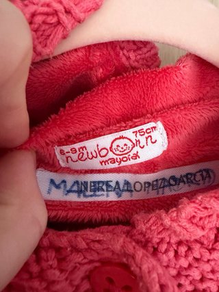 Chaqueta tejida rosa bebé