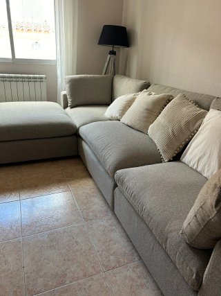 Sofá modular gris de tela