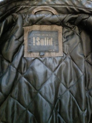Chaqueta efecto piel y vaquero
