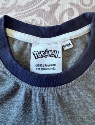 Lote 2 camisetas Pokemon y Capitán América T-10