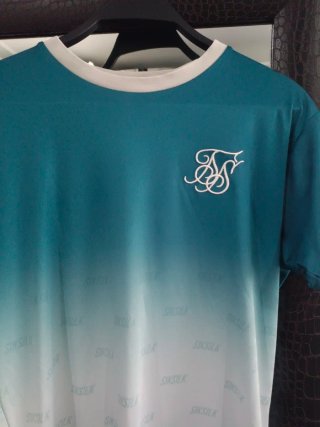 Camiseta SikSilk degradado azul y blanco