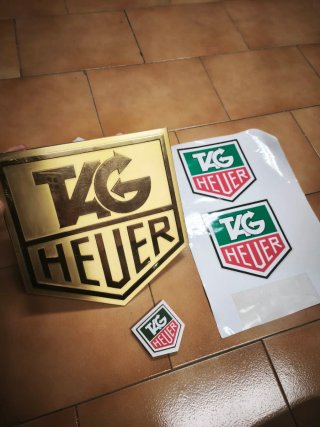 Placa TAG Heuer Dorada