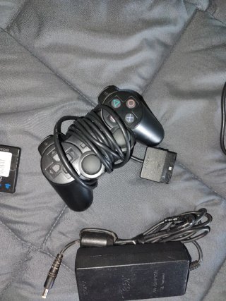 PlayStation 2 Slim SCPH-7704 Negra
