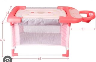 Cuna de muñecas rosa