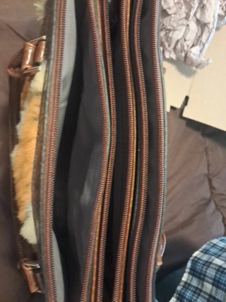 Bolso de mano floral marrón y naranja