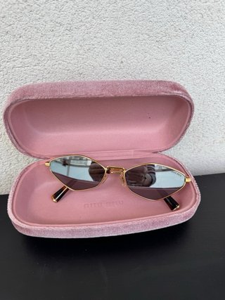 Gafas de sol Miu Miu doradas y marrones