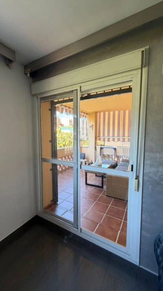 Ventana climalit corredera con persiana y mosquite