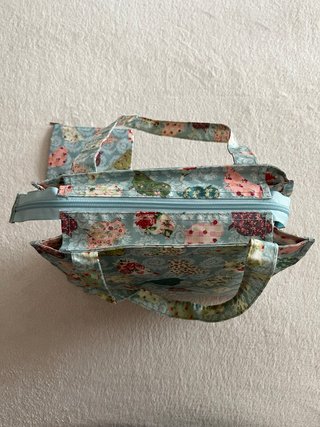 Bolsa plastificada con estampado de pájaros