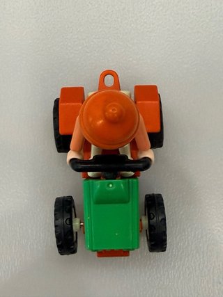 Playmobil Niña en Tractor Verde