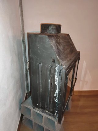 Chimenea de metal y cristal