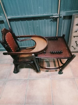 Trona bebé madera y piel antigua