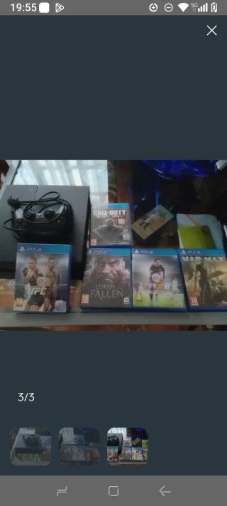 PS4 (PlayStation 4) con mando y juegos