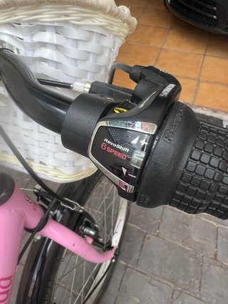 Bicicleta infantil rosa con cesta y asiento muñeca