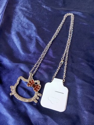 Cadena con colgante Hello Kitty de lazo marrón