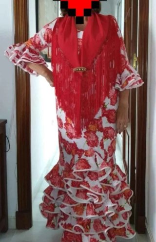 Traje de flamenca volantes y flecos