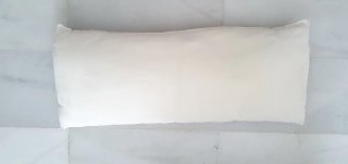 Almohada de tela blanca
