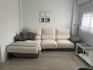 Sofá chaise longue de tela