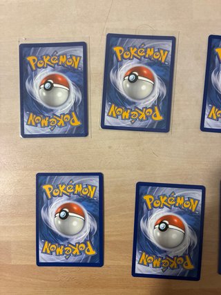 Carte Pokémon: Alakazam, Hypno, Reshiram, ecc.